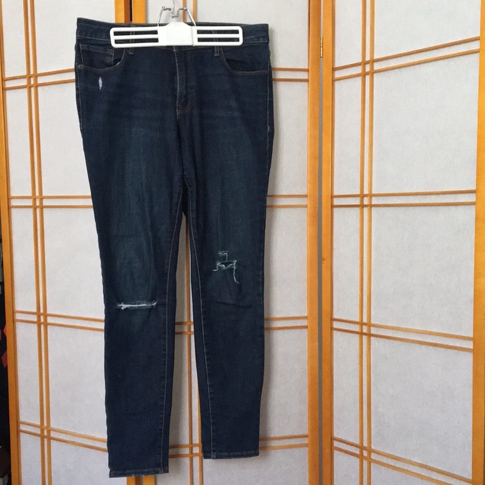 Medium-dark wash Old Navy jeans with ripped knees